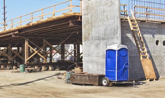 ensuring proper sanitation at the construction site with these portable restrooms